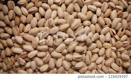 Organic Salted Pistachios Close-Up With Smooth Dolly Movement.high-Protein Snack Organic Salted Pistachios Close-Up With Smooth Dolly Movement.high-Protein Snack 128429397
