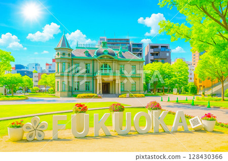 The old Fukuoka Prefectural Public Hall and Guest House with young leaves and fresh greenery 128430366