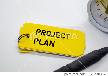 Project Plan on yellow notepad with black marker Project Plan on yellow notepad with black marker 128430387