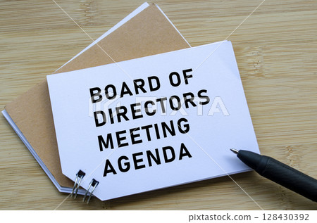 Board Of Directors Agenda on wooden table with pen Board Of Directors Agenda on wooden table with pen 128430392
