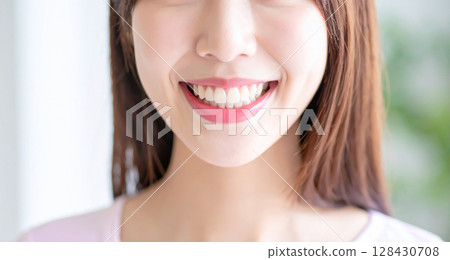 Young woman with white teeth 128430708