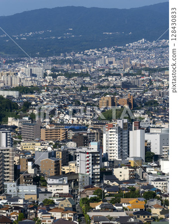 Densely built cityscape seen from a high vantage point Densely built cityscape seen from a high vantage point 128430833