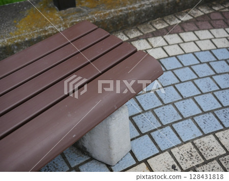 Art created by interweaving benches and tiles. Relaxing time. Copy space. Art created by interweaving benches and tiles. Relaxing time. Copy space. 128431818