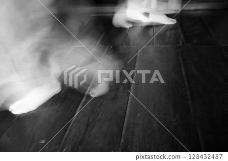 People walking around indoors People walking around indoors 128432487