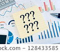 Sticky note with graph and question mark 128433585