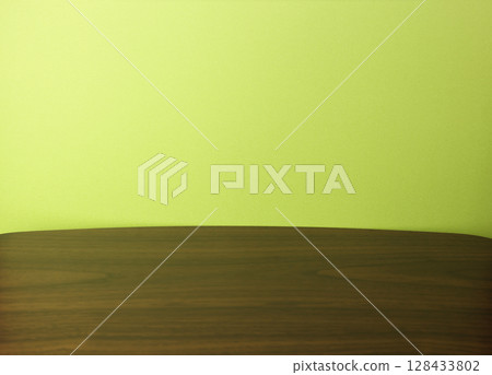 Yellow-green walls and wooden desk 128433802