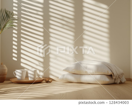 serene space featuring soft pillows, wooden tray, and cups, illuminated by gentle shadows. Perfect for relaxation and mindfulness 128434003