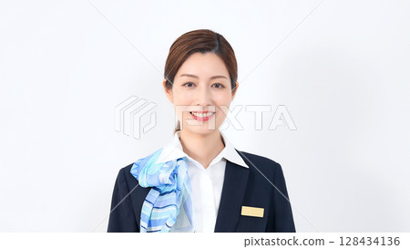 Smiling female store clerk/receptionist 128434136