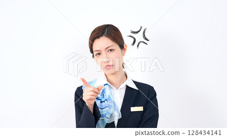 Angry female store clerk/receptionist scolding 128434141