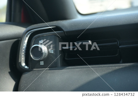 interior view of car with black leather, closeup car air conditional vents 128434732