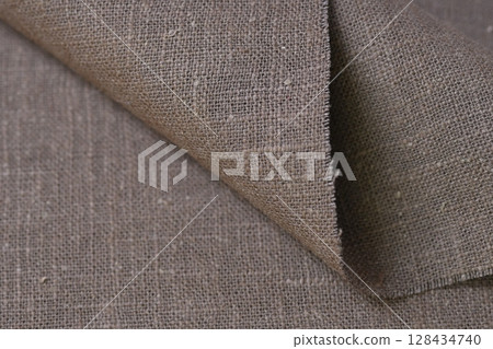drak brown hemp viscose natural fabric cloth color, sackcloth rough texture of textile fashion 128434740