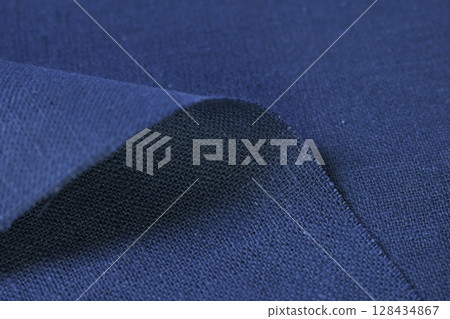 blue hemp viscose natural fabric cloth color, sackcloth rough texture of textile fashion 128434867