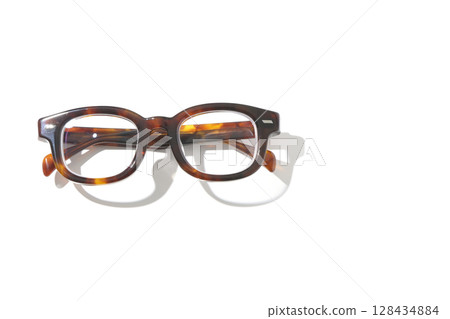 Glasses photographed on a white background 128434884