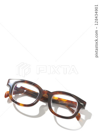 Glasses photographed on a white background 128434901