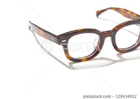 Glasses photographed on a white background Glasses photographed on a white background 128434912