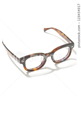 Glasses photographed on a white background Glasses photographed on a white background 128434917