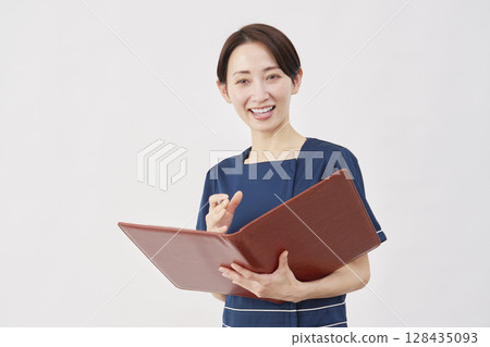 Female beauty nurse interview white background 128435093