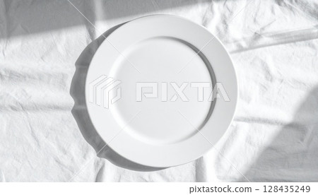 Minimalist dining: clean table setting with soft shadows 128435249
