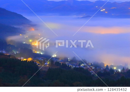 Yufuin sea of clouds before sunrise (Yufuin Town, Yufu City) 128435432