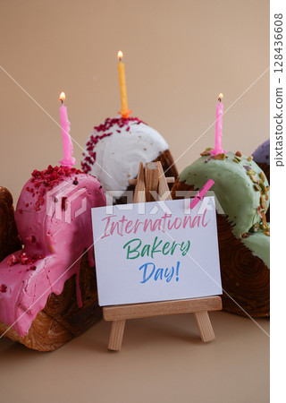 International bakery day greeting card Delicious fresh croissant topped with colorful flavor Ganache. Creation unique heart shape bakery. Puff pastry holiday love gift present idea International bakery day greeting card Delicious fresh croissant topped with colorful flavor Ganache. Creation unique heart shape bakery. Puff pastry holiday love gift present idea 128436608