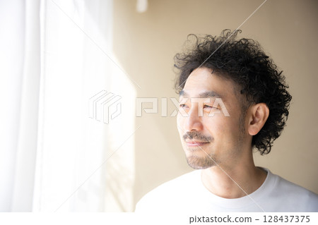 Bearded man profile portrait close up 128437375