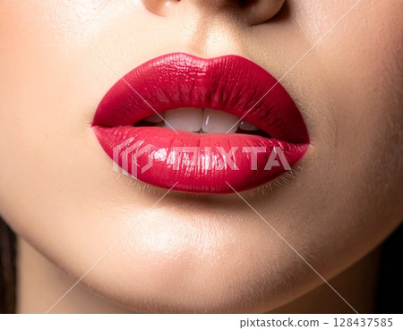 Woman's lips with red lipstick 128437585