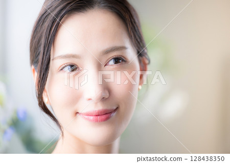 Beauty skin care. Close-up of beautiful woman with natural skin. Spring/summer image. Beauty skin care. Close-up of beautiful woman with natural skin. Spring/summer image. 128438350
