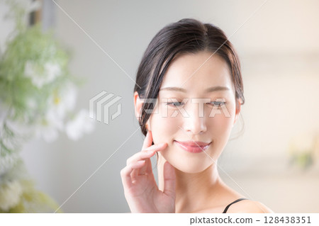 Beauty skin care. Close-up of beautiful woman with natural skin. Spring/summer image. Beauty skin care. Close-up of beautiful woman with natural skin. Spring/summer image. 128438351