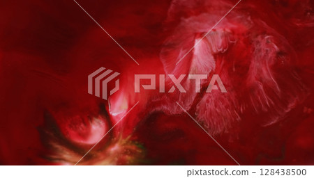 Ripple texture. Liquid flow. Defocused red pink color paint in water fluid marble emulsion spreading on abstract dark black background. Ripple texture. Liquid flow. Defocused red pink color paint in water fluid marble emulsion spreading on abstract dark black background. 128438500