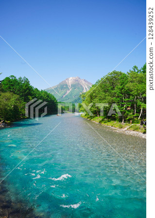 Nagano, Kamikochi, Azusa River in early summer, lit up by fresh greenery 128439252