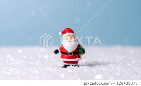 Miniature Christmas Santa Claus doll figure tree frame background 128439373