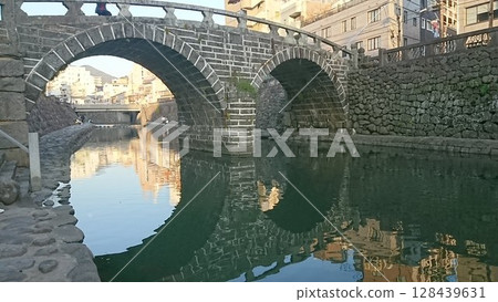 Spectacles Bridge reflected on the water 128439631