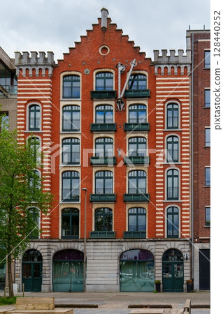 Historic Warehouse Architecture in Antwerp, Belgium A Charming Urban Landscape Scene 128440252
