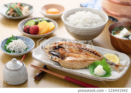 Freshly grilled horse mackerel fillet and Japanese breakfast with rice and miso soup Freshly grilled horse mackerel fillet and Japanese breakfast with rice and miso soup 128441942