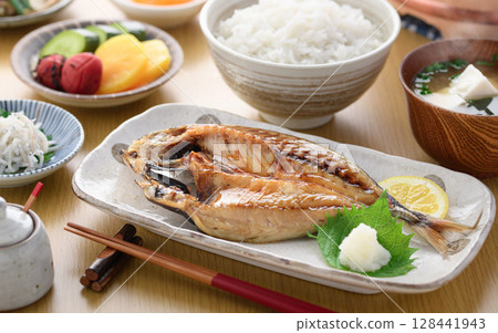 Freshly grilled horse mackerel fillet and Japanese breakfast with rice and miso soup Freshly grilled horse mackerel fillet and Japanese breakfast with rice and miso soup 128441943