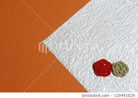 Japanese-style background with mizuhiki decorations Orange background 128442829