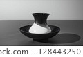 The minimalist appearance of the vessels is enveloped in the silence of monochrome. 128443250