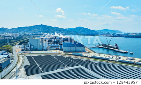 Aerial view of industrial area and mega solar power plant 128443957