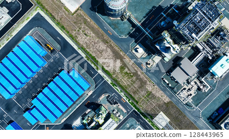 Aerial view of an industrial area lined with factories 128443965