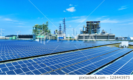 Aerial view of biomass power plant and wind and solar power plant 128443973