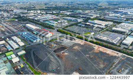 Aerial view of an industrial area lined with factories 128443997