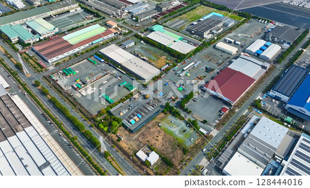 Aerial view of an industrial area lined with factories 128444016