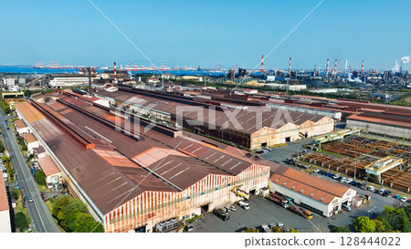 Aerial view of an industrial area lined with factories 128444022