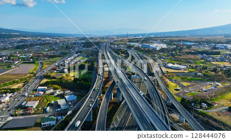Aerial view of the highway running through the plains Aerial view of the highway running through the plains 128444076