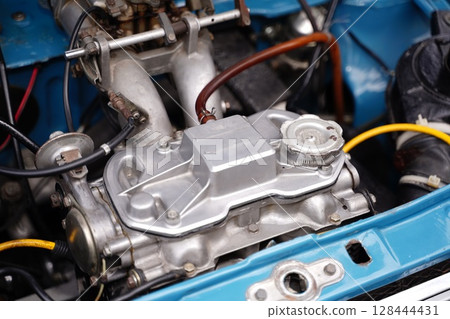 Compact old car engine Compact old car engine 128444431