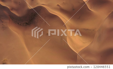 Aerial top view on sand dunes in desert 128446551