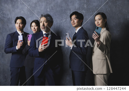 Businessmen with smartphones 128447244