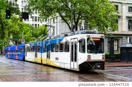 Portland light rail train at Pioneer Courthouse station in downtown Portland, Oregon, United States 128447310