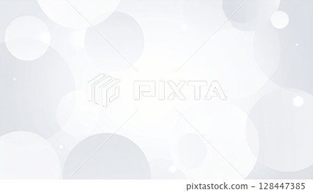 Bright white abstract background with glowing defocused blue and silver Christmas bokeh circles Bright white abstract background with glowing defocused blue and silver Christmas bokeh circles 128447385