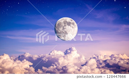 Moonlight illuminates a dark fantasy landscape under a sky full of stars 128447666